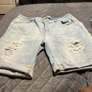 Distressed denim jean shorts,
